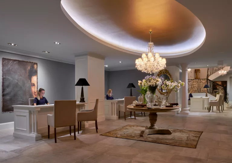 receptionists working in a hotel lobby