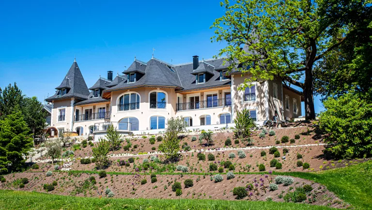 Outdoor view of hotel on a small hill
