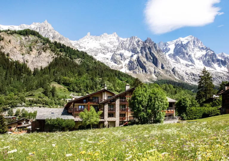 chalet style hotel nestled in the mountains