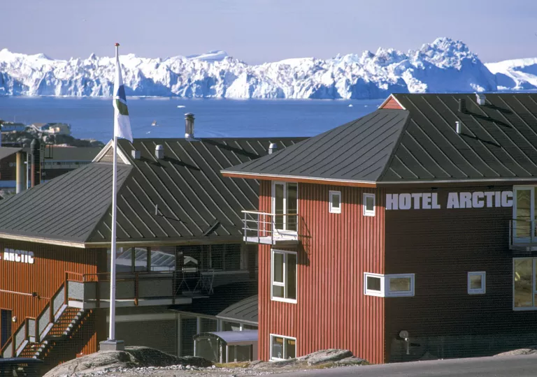 Hotel with icebergs in the background