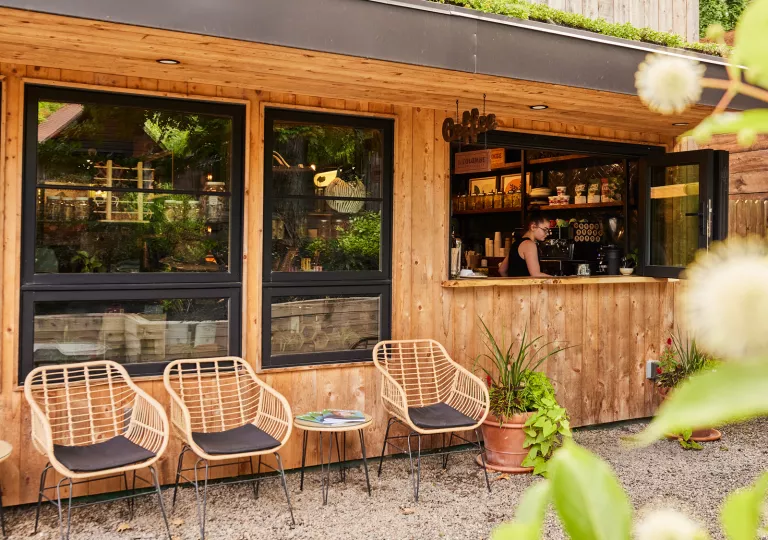 wooden bar with chairs