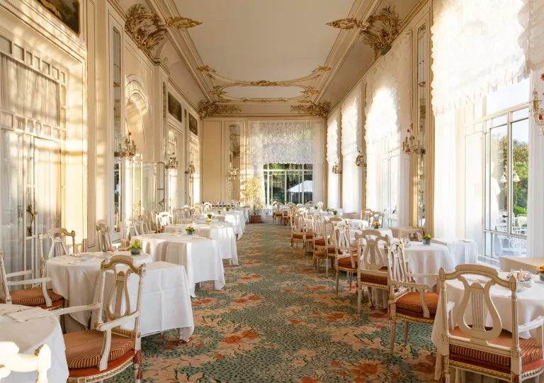 baroque dining room with carpeted floors