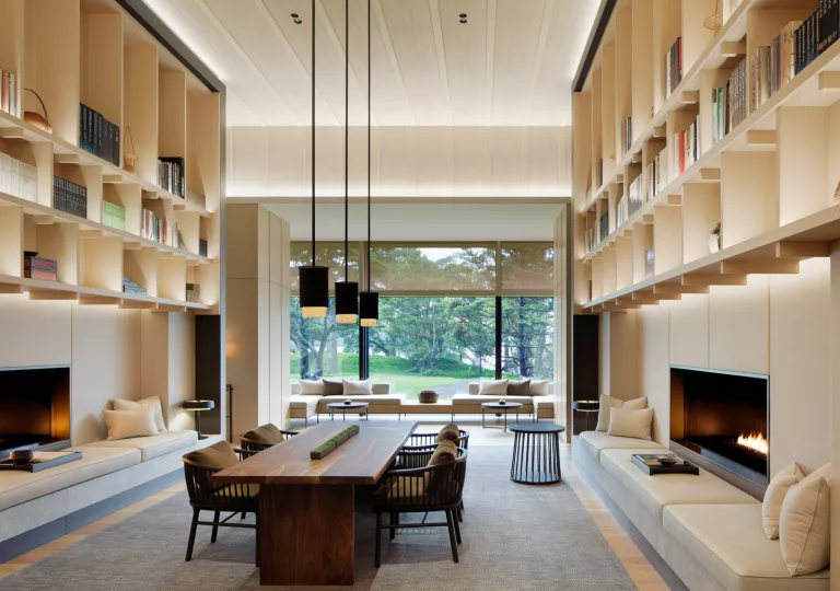 Large dining room table with book cases on either side