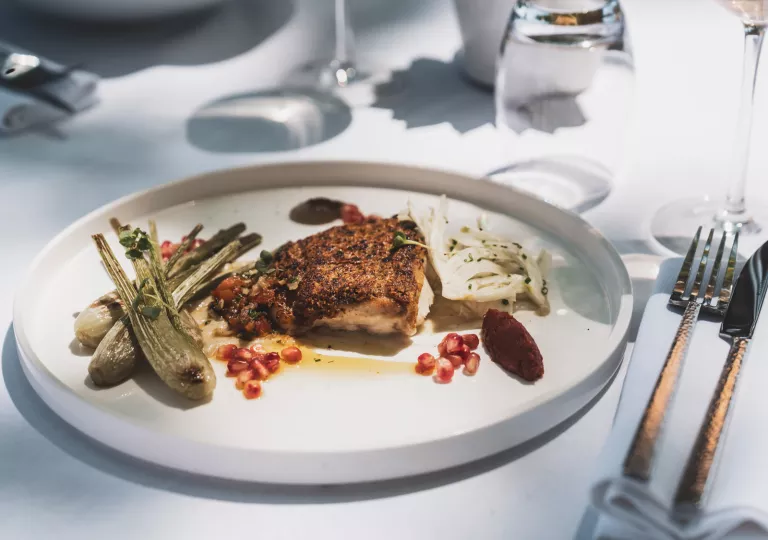 Plate with roasted chicken and vegetables