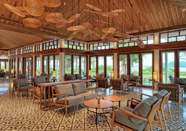 room with tiled floors and lounge furniture