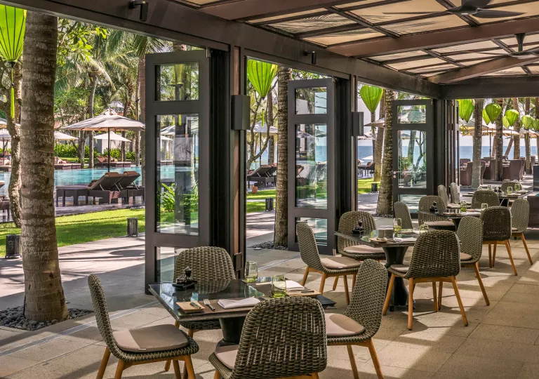 Open air dining room overlooking the pool