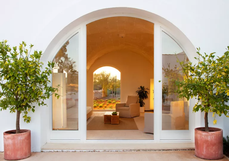 arched doorway looking into living space