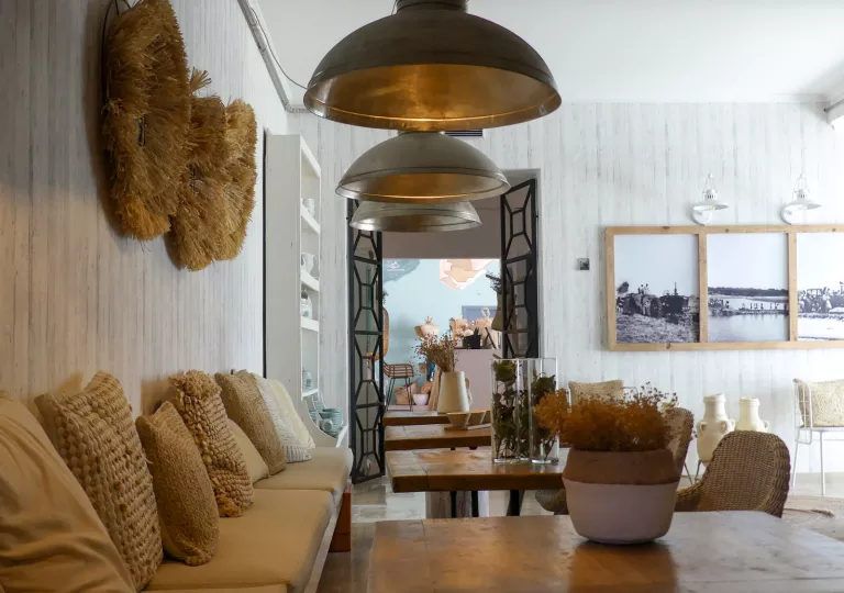 Lobby with tab cushions on a bench and wooden furniture