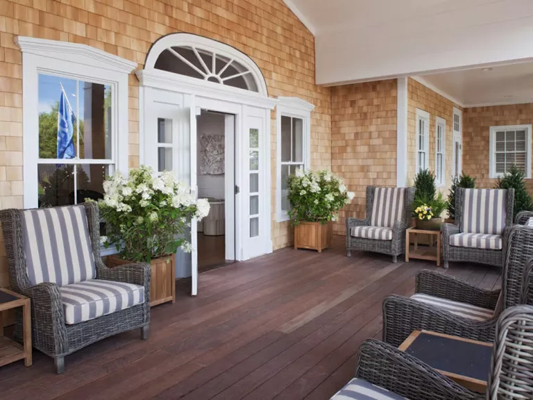 wooden deck with Adirondack chairs