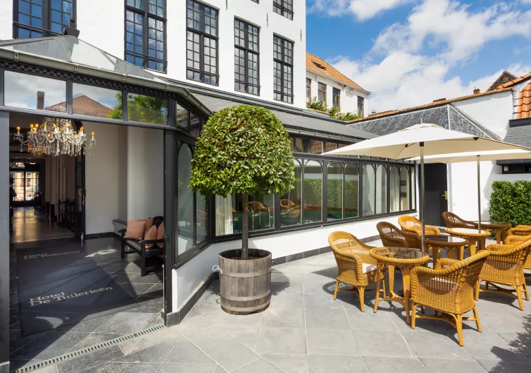 patio furniture outside of hotel