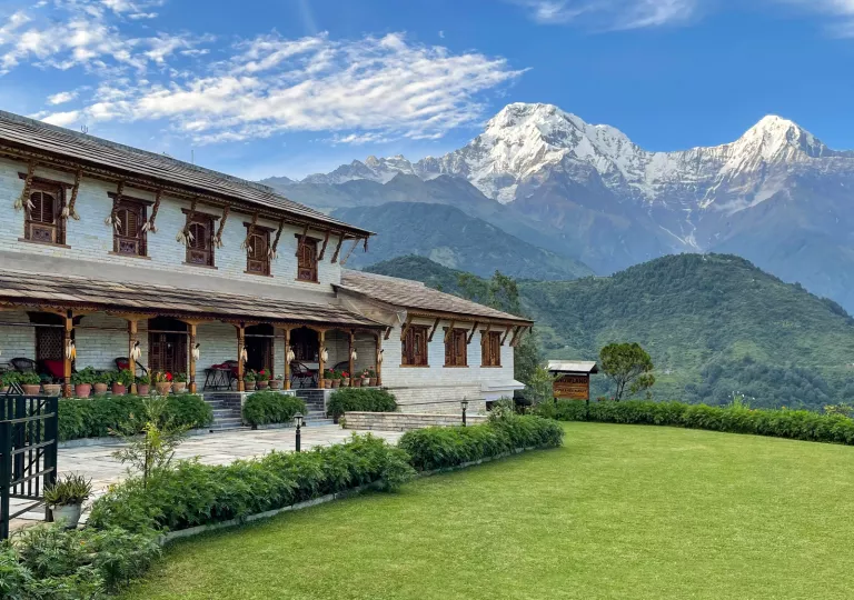 sprawling lawn with hotel in background