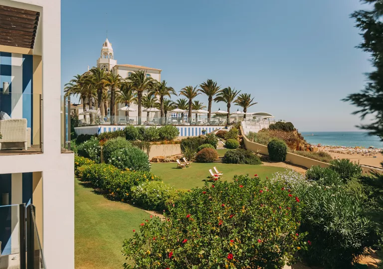 manicured gardens on the shore of a beach