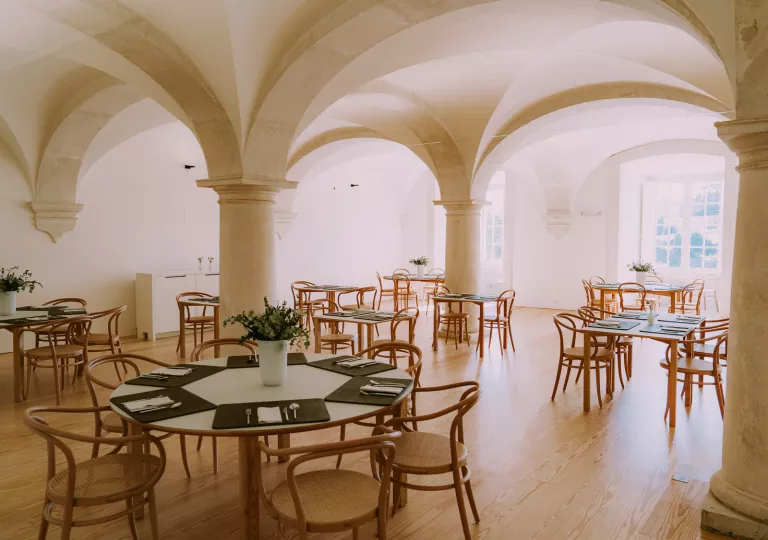 hotel dining room with big arched cielings