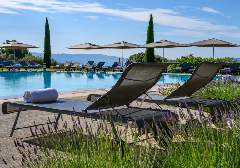 lounge chairs by the pool