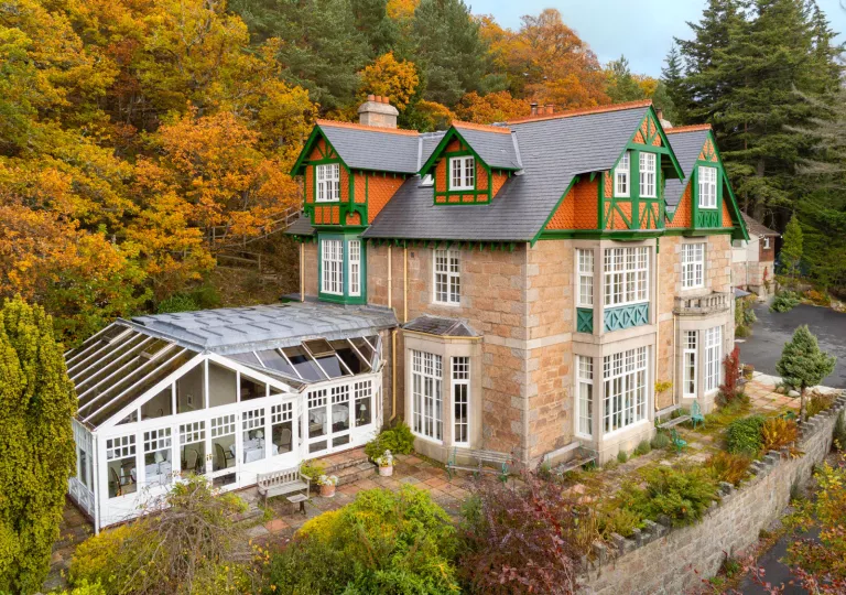 exterior of hotel surrounded by trees