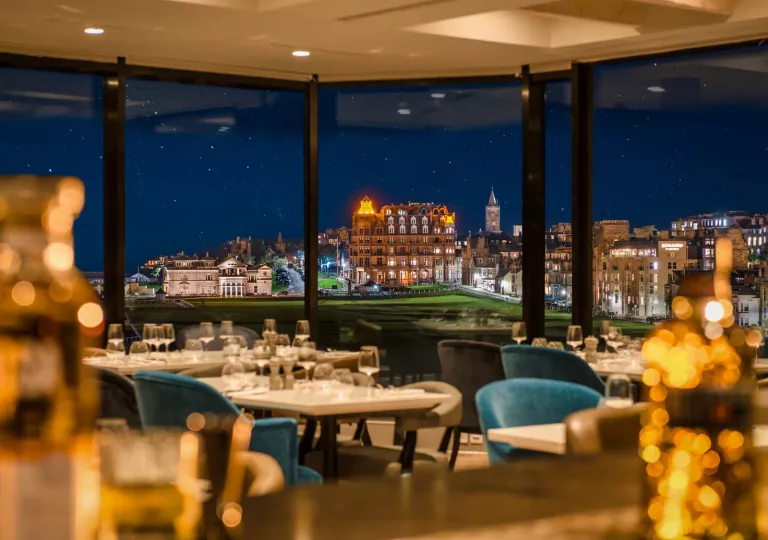 dining room with large windows and view of castle