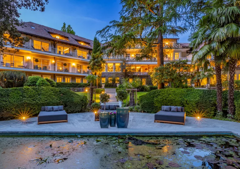 exterior of hotel lit at night