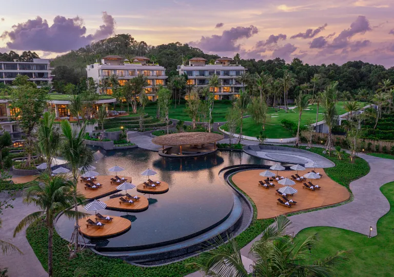 Exterior view of hotel grounds and swimming pool