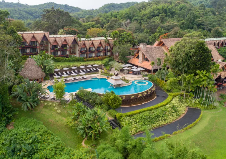 hotel and pool forested area