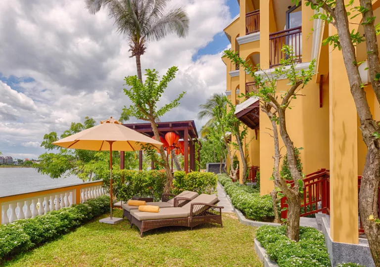Yellow building on the right, and a large lake to the left