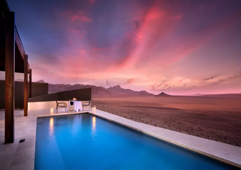 pool under pink sunset
