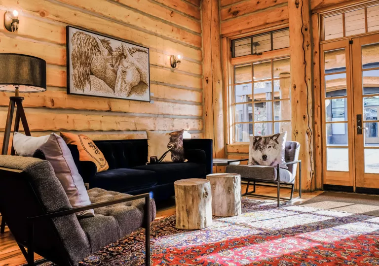 wood paneled living room with a horse painting