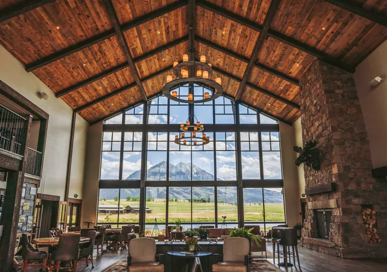 room with high vaulted ceilings and light fixtures