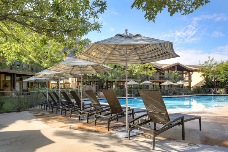 pool with lounge chairs