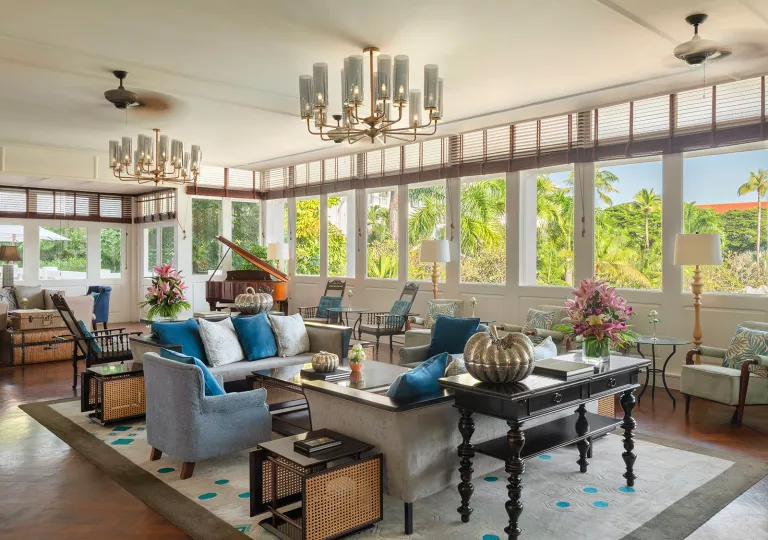 Hotel lobby and waiting room with cushioned sofas and large windows