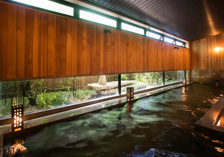 Large indoor onsen bath with large windows
