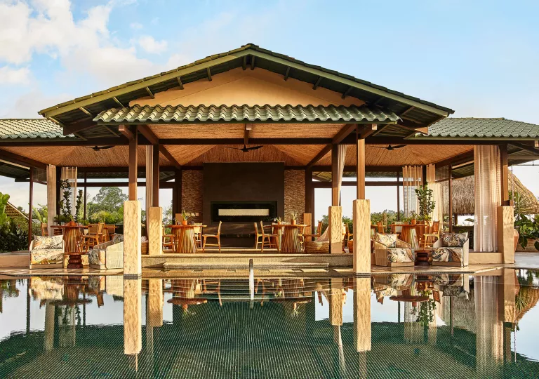 Reflecting pool next to covered dining area