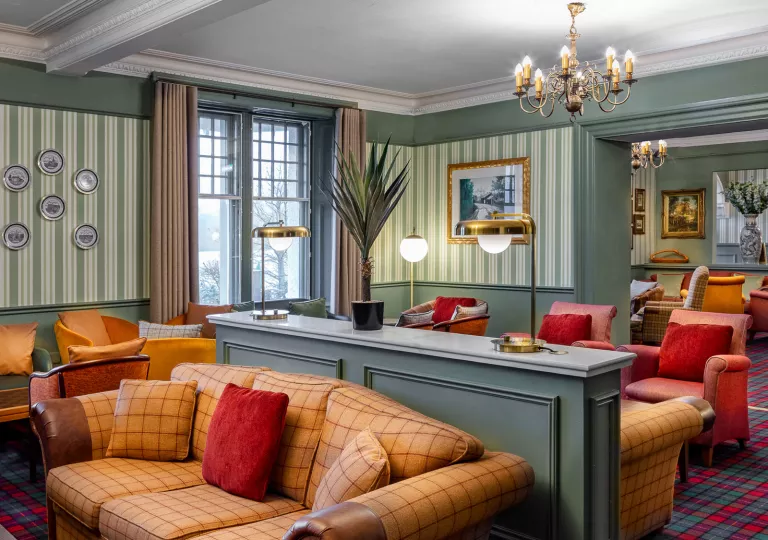 Lobby with brown cushioned sofas and blue furniture