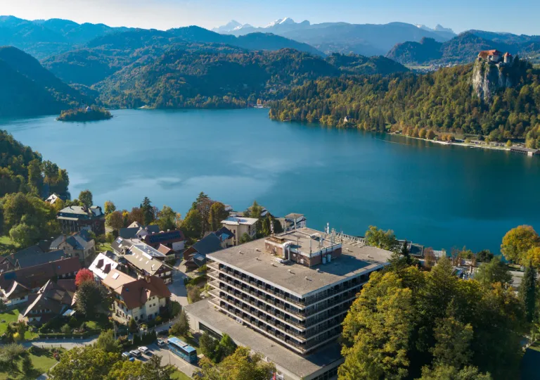 Sky view of a large lake with buildings surrounding it