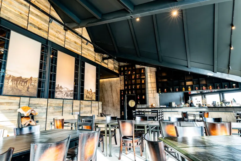 Restaurant with large wooden tables and chairs