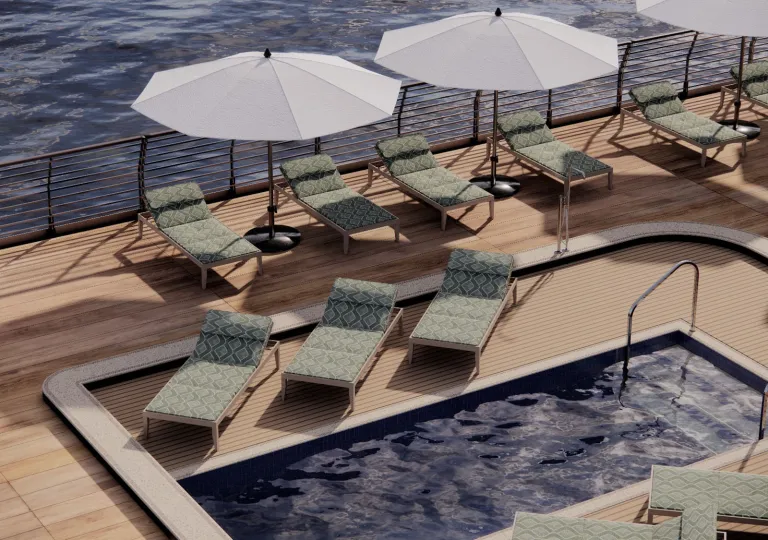 Sun deck aboard a luxury river cruise ship featuring a small pool, cushioned lounge chairs, white umbrellas, and river views from the surrounding deck.