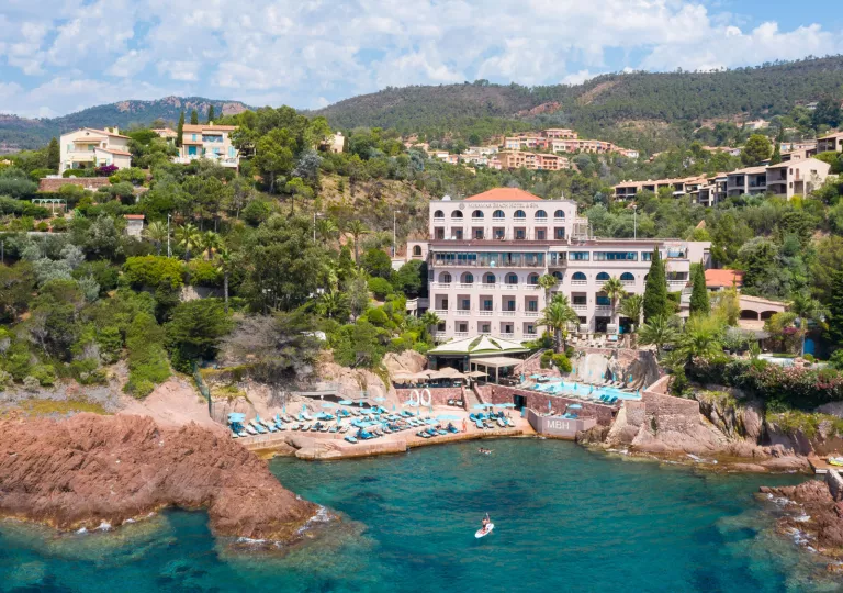 Exterior view of hotel building in front of the ocean
