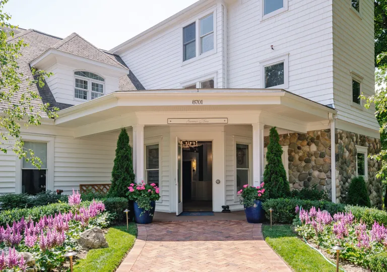 The exterior entrance to The Summer House at The Inn at Stonecliffe on Mackinac Island.