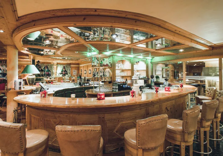Bar and lounge with stools and a circular bar counter