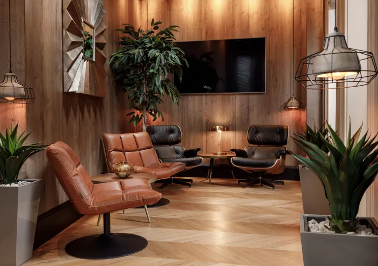 Lounge and sitting area with wooden floor and walls