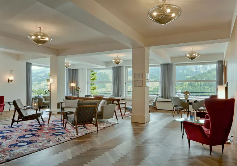 Hotel lobby with open layout and chairs with tables