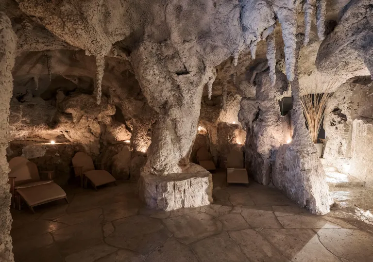 Cavern-style room with reclining chairs