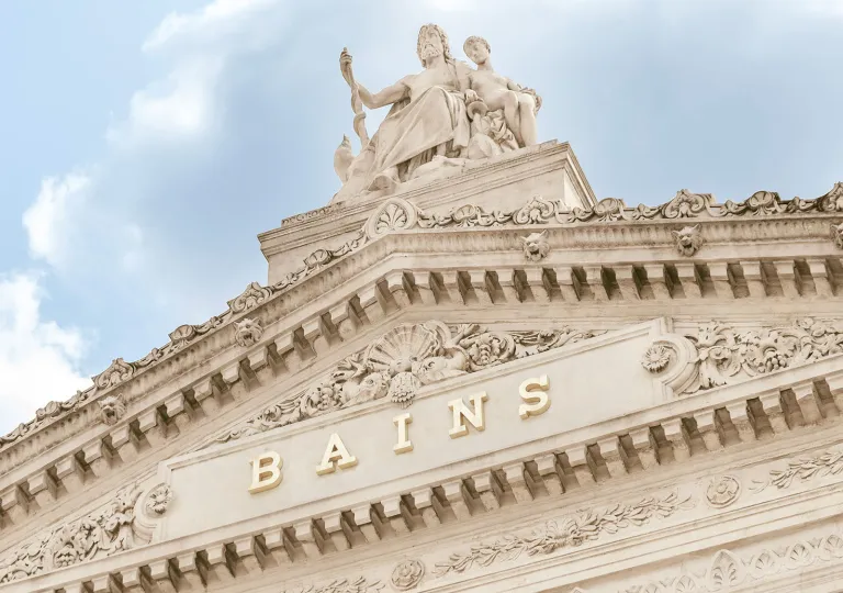 Exterior view of stone sculpture on top of a building