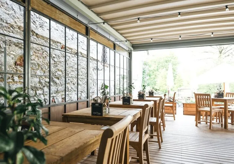 Rustic dining room at Boutique Hotel Latrán in Český Krumlov, Czech Republic.