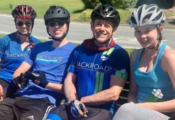 Tom Hale biking with his kids - Backroads