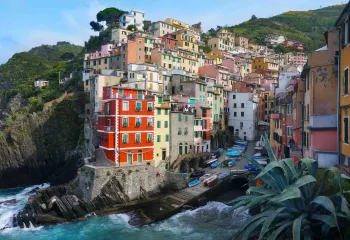 View of buildings built into coastal cliffs