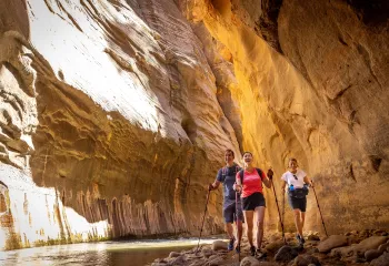 Group of hikers walking in a cavern