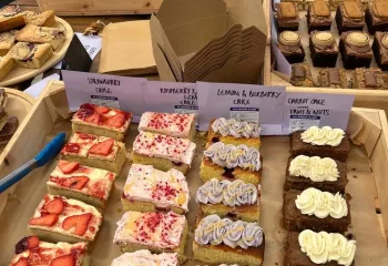 Wooden tray of cakes and pastries