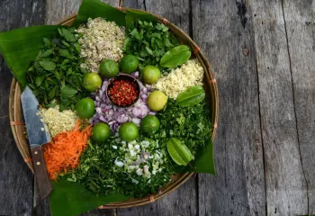 Fresh Chopped veggies, herbs, spices and limes from the Pun Pun farm in Thailand