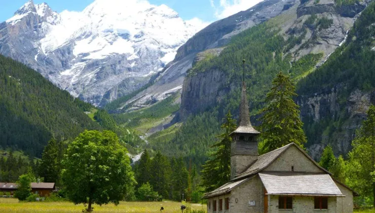 church beneath the mountains in Kandersteg, Switzerland