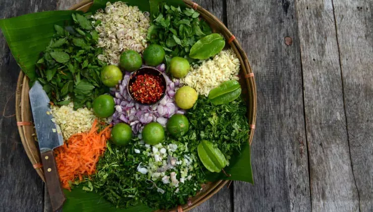 Fresh Chopped veggies, herbs, spices and limes from the Pun Pun farm in Thailand
